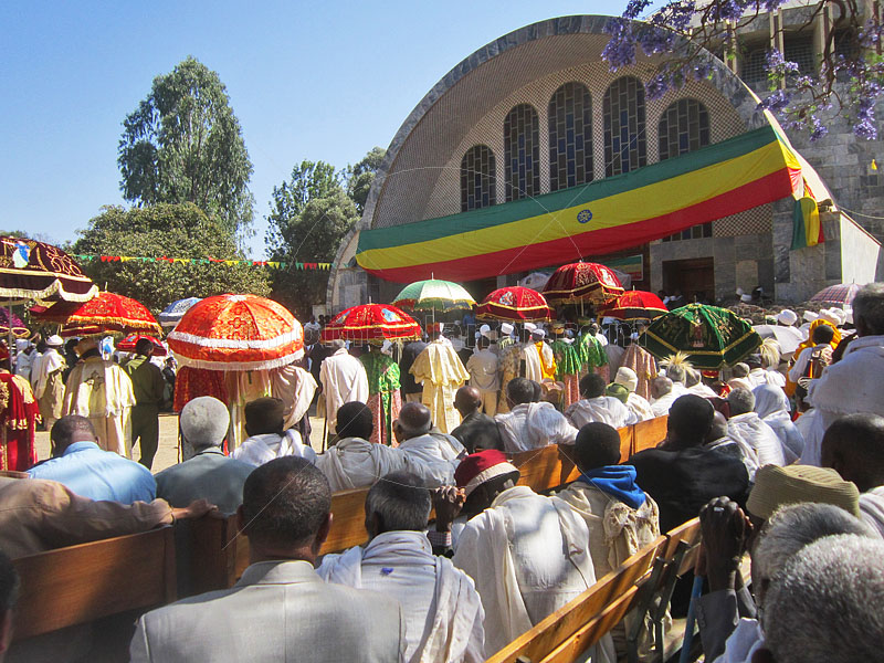 Worshippers outside the new church of 'St Mary of Zion' for Tablet Chapel Dedication Ceremony