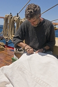 Buddy sail-making on the quarterdeck