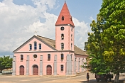 The pink-painted Church of the Catholic Mission.