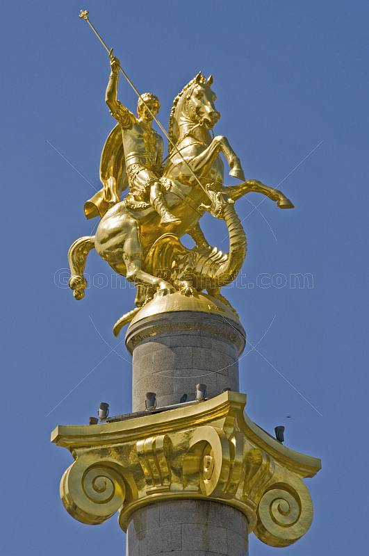 The golden statue of St George killing the Dragon tops the column in Freedom Square.