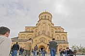 Eastern Orthodox worshippers walk to mass at the Sameba Cathedral.