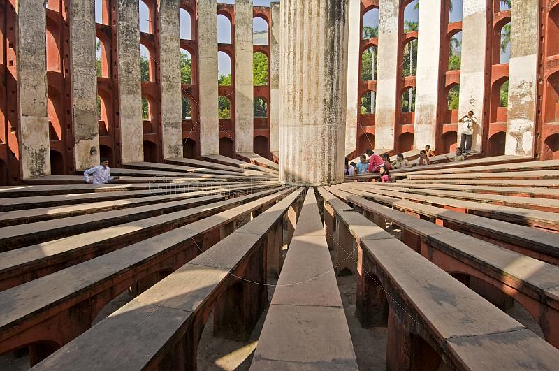 Visitors explore the Ram Yantra, used to measure horizontal and vertical angles of celestial bodies, at the Jantar Mantar observatory on Sansad Marg.