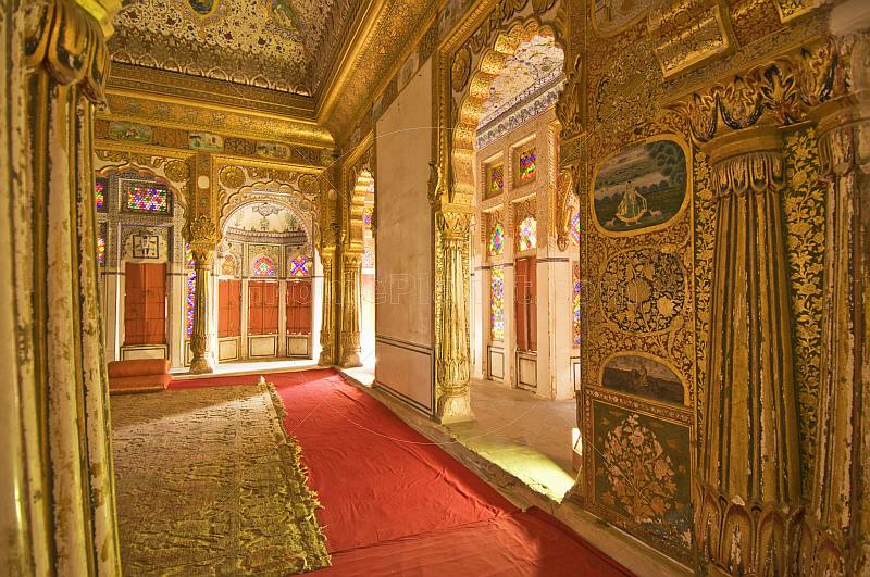 Ornate gilded throne room in the Meherangarh Fort Palace Museum.