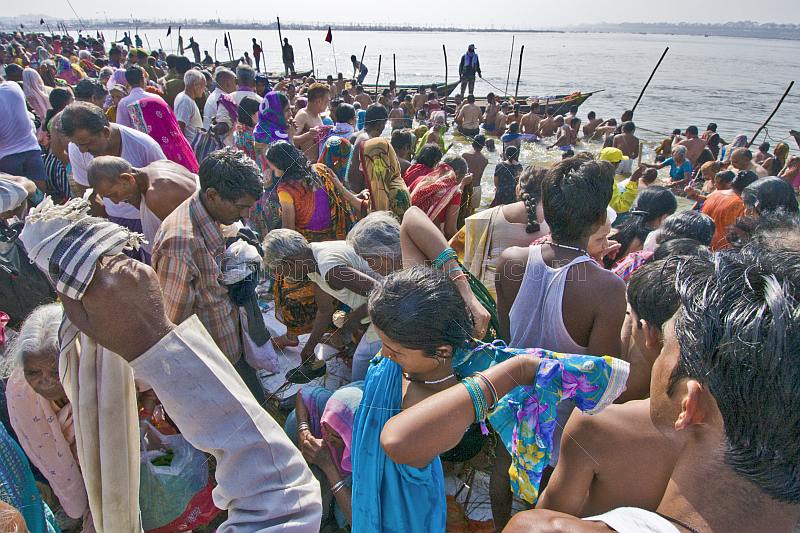 Mass crowds of Hindu pilgrims bathe at Ganges Sangam on Basant Panchami Snana.