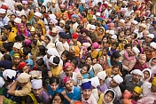 A festive crowd of Sikh worshippers wait outside of the Gurudwara Bangla Sahib on Baba Kharak Singh Marg.