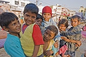 Rajasthani street children jostle to get in front of the photographers lens.