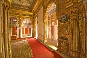 caption: Ornate gilded throne room in the Meherangarh Fort Palace Museum.