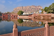 The Meherangarh Fort reflected in the still waters of the Gulab Sagar.