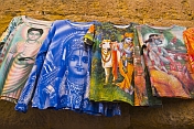 A selection of colorful teeshirts on sale to the backpacker visitors to this desert city.