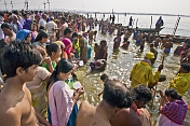 Mass crowds of Hindu pilgrims bathe at Yamuna Sangam on Basant Panchami Snana.