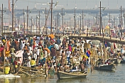Crowded Bathing Area On The Fast Flowing Ganges River