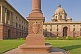 Image of Red sandstone Dominion Column with coat of arms outside the North Block Secretariat.