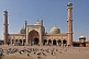 Image of Pigeons feeding in the courtyard of the Jama Masjid built by Shah Jahan in 1644.