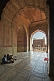Two elderly Muslim men chat in the cool interior of Shah Jahan's Jama Masjid built in 1644.