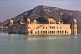 Image of The Nur Mahal or Water Palace, set in picturesque lake and mountain scenery.