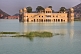 Image of The Nur Mahal or Water Palace, set in picturesque lake and mountain scenery.