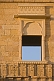 Richly-carved wall and window surround on a havelli in the old quarter.