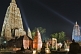 Image of Twilight view of small stupas and shrines in front of the main Mahabodhi Temple.