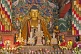 Buddhist statue in colorful robes at the Bhutanese Temple.