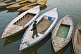 Image of Rowing boats for pilgrims on the Ganges River at sunset.