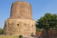 Image of The 5thC Dhamekh Stupa at Sarnath, where the Buddha gave his first sermon in the deer park.