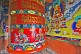 Image of Large colorful prayer wheel in Buddhist monastery.