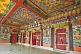 Image of Monk goes into the main temple in the Rumtek Buddhist Monastery.