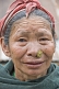 Image of Sikkimese hill-lady with gold nose-jewellry.
