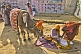 Image of Holy cow with extra leg is honored by village woman at Kumbh Mela festival.
