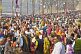 Image of Dense crowds of Hindu pilgrims fill the bathing ghats at the Ganges Yamuna Sangam.