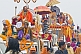 Image of Holy Men wait patiently on vehicle roofs for Hindu procession traffic jam to clear.