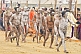 Naked Naga Holy Men return in procession from holy river ritual bathing.