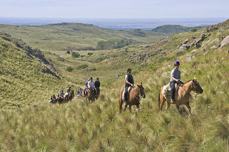 Horse-back trekker group at the Estancia Los Potreros.
