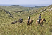 Horse-back trekker group at the Estancia Los Potreros.