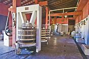Wine pressing equipment in the Bodega Nanni winery.