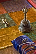 Buddhist prayer bell and book at the Singino monastery.