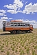 A Dragoman Overland truck parked in the bare Mongolian plains.