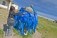 Image of Old Mongolian lady hangs prayer scarves at the Erdene Zuu Khiid (Hundred Treasures Monastery).