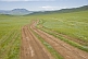 Image of Un-surfaced dirt roads cross the Mongolian grassland.