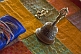 Image of Buddhist prayer bell, book and vajra at Singino monastery.