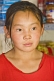 Mongolian shopkeeper's daughter, wearing a red teeshirt.