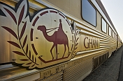 Ghan logo and nameboard on carriage at Alice Springs station