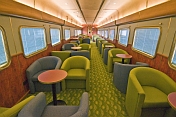 Easy chairs and tables in 'Red Gum' lounge car
