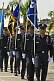 Flag-bearers of the Panamanian National Police forces parade along Avienda Balboa.