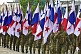 Women soldiers of the Panamanian Defense Forces parade with their national flag along the Avenida Balboa in Panama City.