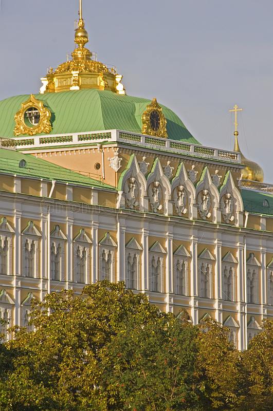 Green copper roofs and golden domes of the Great Kremlin Palace.
