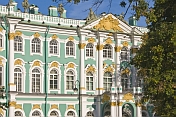 Green and white stucco-work of the Admiralty Buildings, by the River Neva.