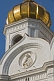 Detail of stone carving and gold dome on the Cathedral of Christ the Saviour which stands next to the Moscow River.