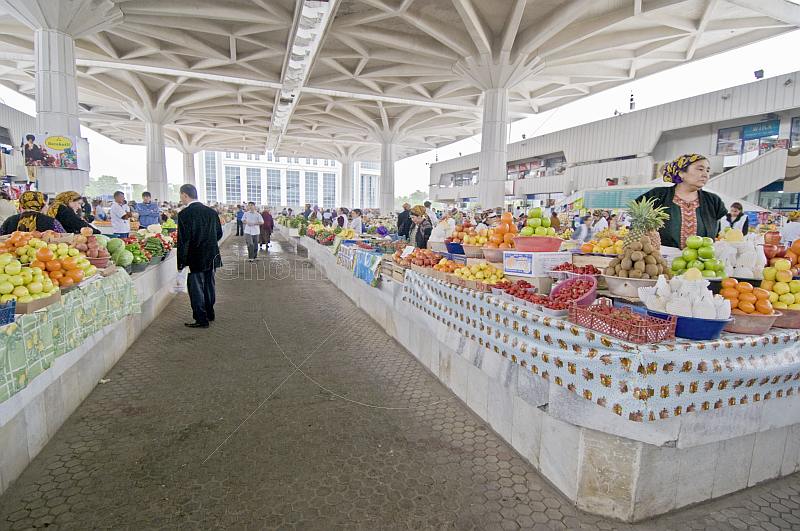 Shoppers and stall holders in the central covered fruit market.