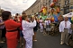 Crowds take photos in front of giant regional chicken floats on Khreshchatyk Street.